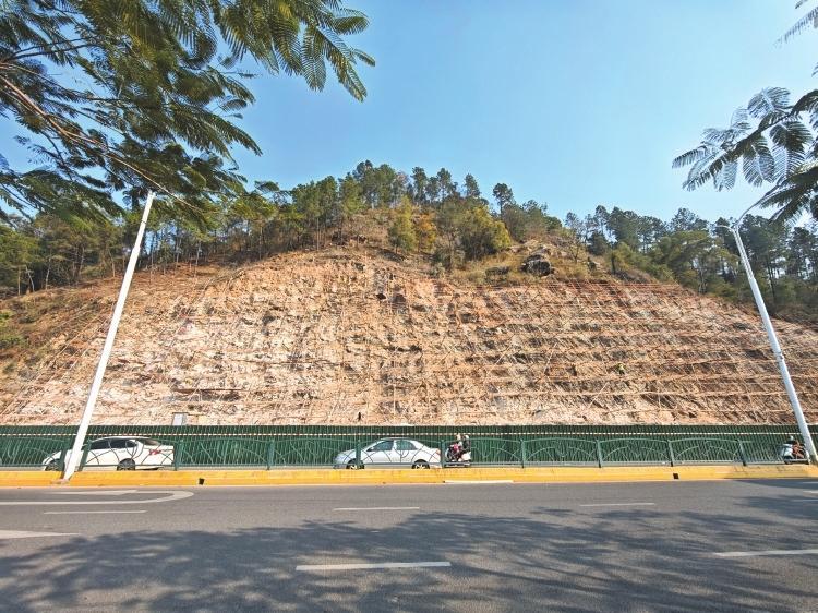 边坡整治实施近半南安南洪路龟山段力争5月完工